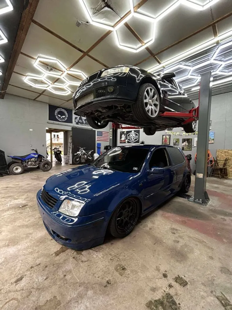 Two-post lift setup in garage