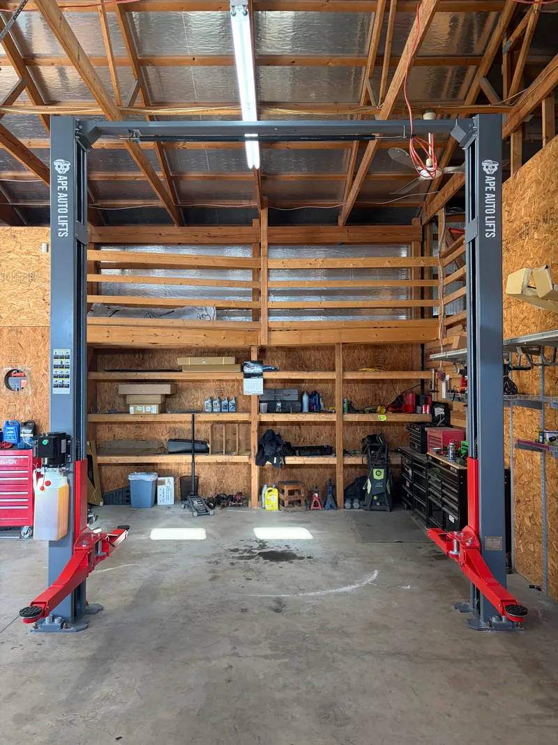 Two-post lift setup in garage