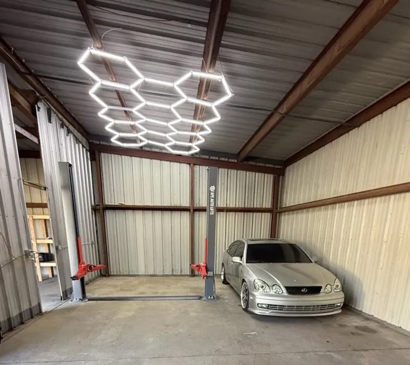 Two-post lift setup in garage