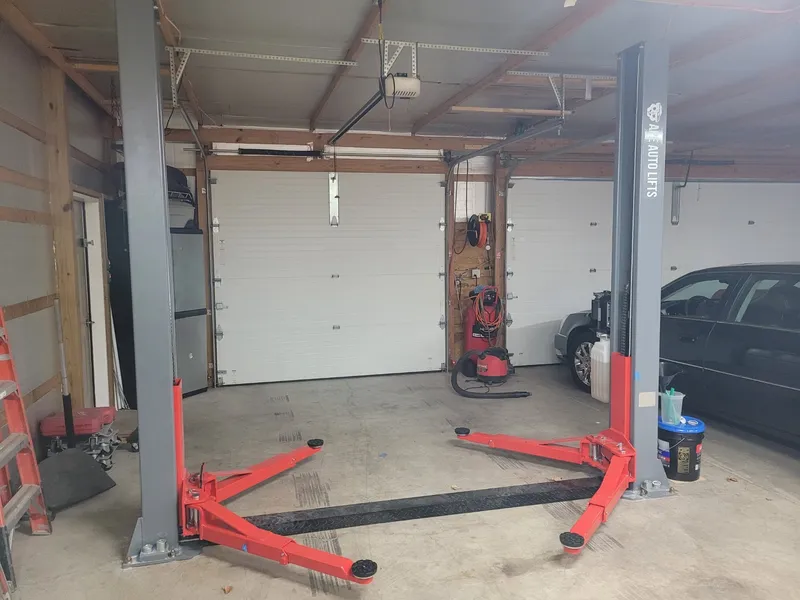 Two-post lift setup in garage