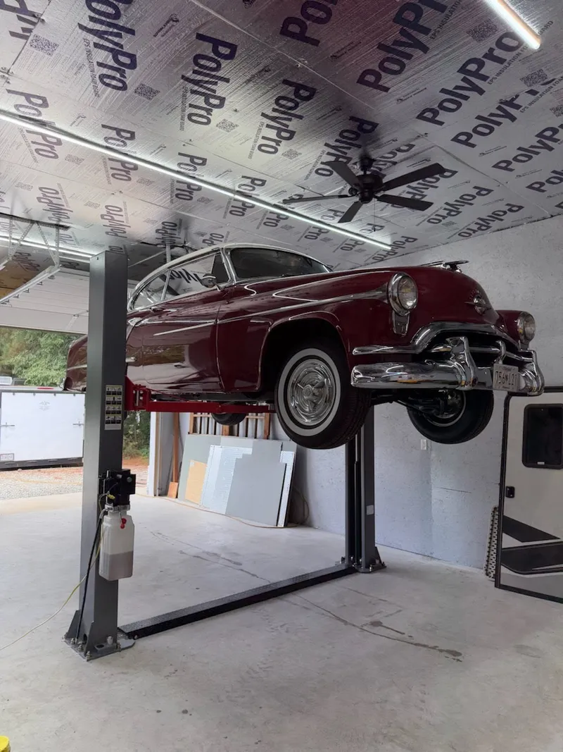 Two-post lift setup in garage