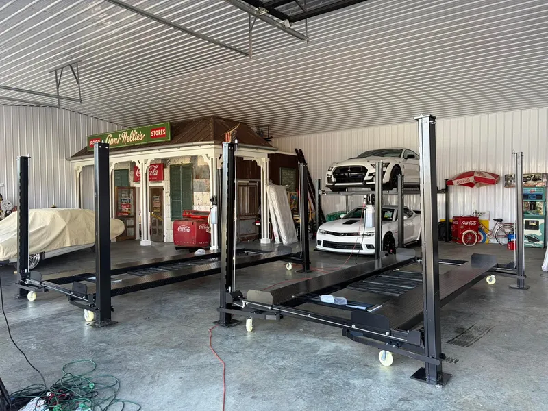 Four-post lift setup in garage