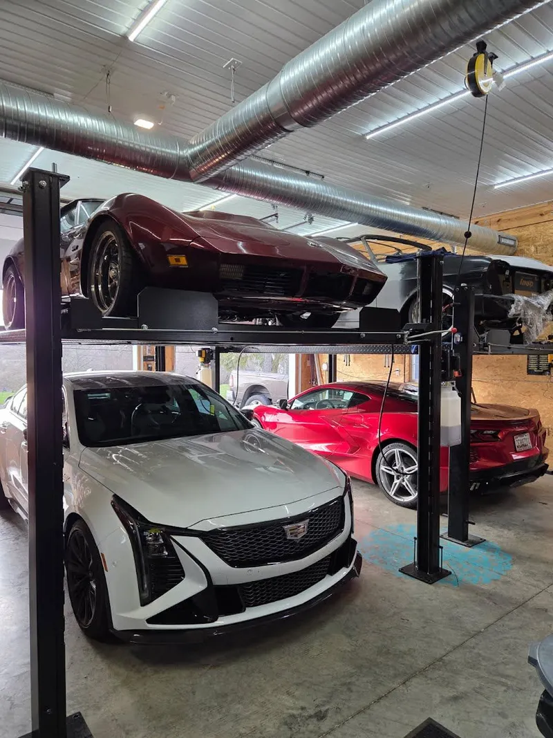 Four-post automotive lift installation