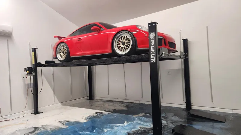 Four-post lift setup in garage